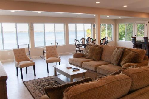 Geneva House | Lakeside Landing Dock Fire Pit and Boat Rental