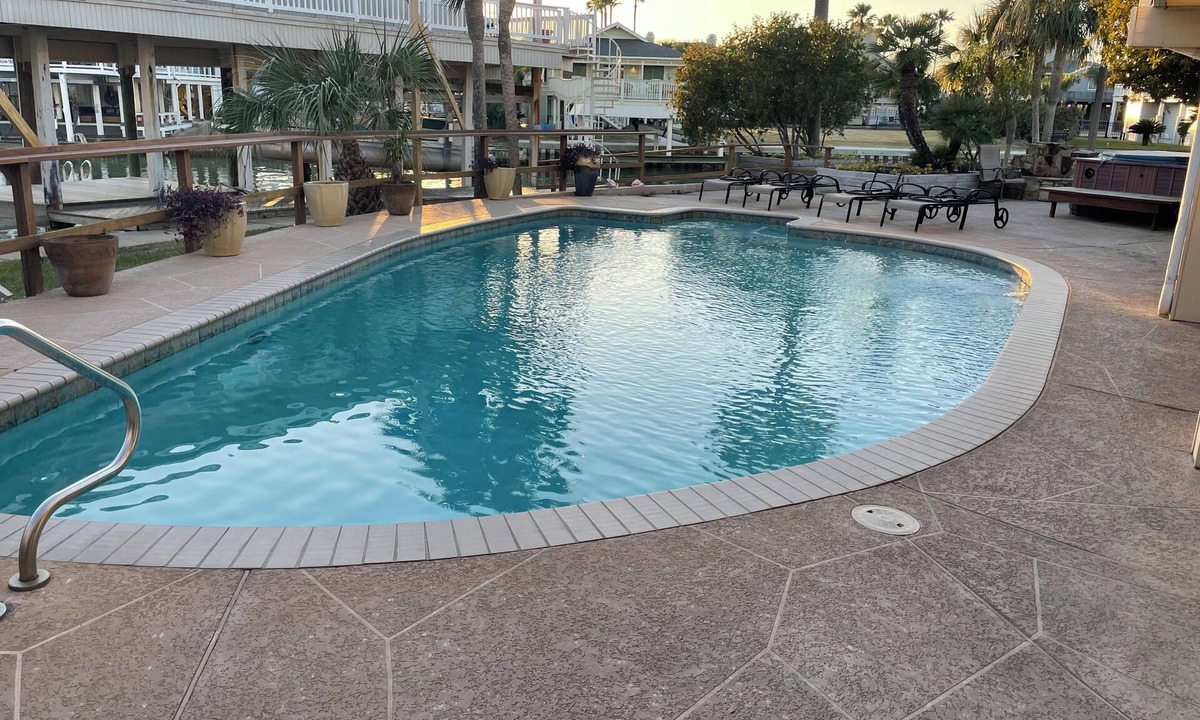 Jamaica Beach House | Lowest prices ever! 8 BR 6 BA pool, hot tub on water proms
