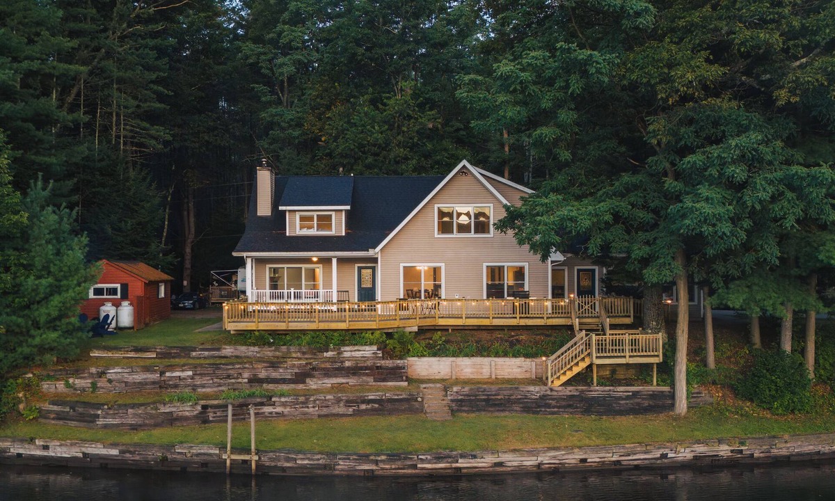 Corinth House | Waterfront Cabin with expansive deck near Saratoga & Lake George