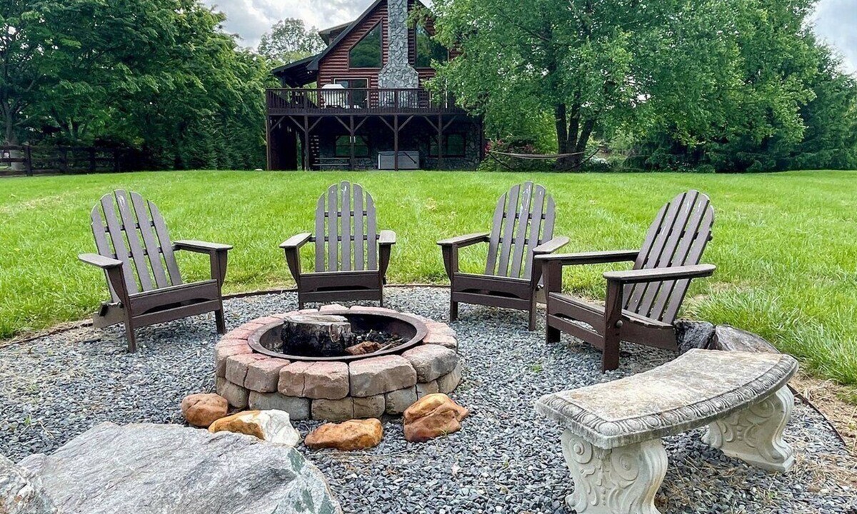 Jefferson Cabin | Waters Edge Riverfront Cabin | Hot Tub, Firepit & New River Views for the Whole Family