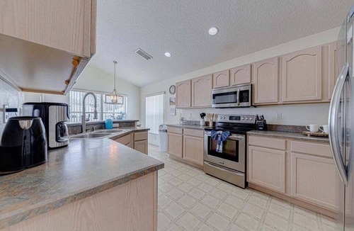 Orange Tree Villa | 10 - Beautiful home with Sparkling Pool & Games Room Near Disney Parks