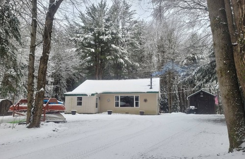 Arcade Cabin | A short walk to a private beach for swimming boating or fishing