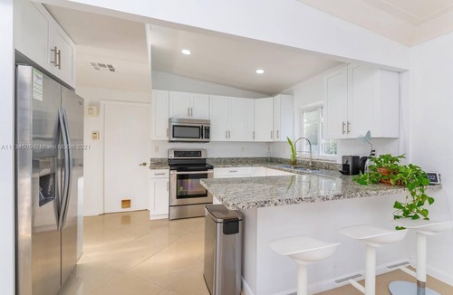Central Fort Lauderdale House | Amazing backyard for Family vacation with heated pool.