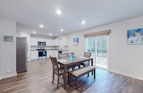 St. James House | Beach and Golf Retreat: Coastal home with community pool, close to beach and local attractions!