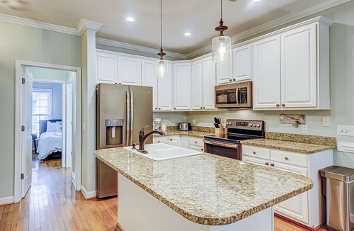 Folly Beach Villa | Beachy, three-story villa w/deck & shared pool - walk downtown & to the beach