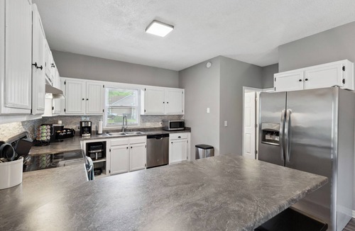 Madison House | Beautiful home in quiet neighborhood with arcade room. Pet friendly!