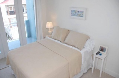 White Sands First House | Beautiful Pensacola Beach, Gulf Front 4BR/3.5BA, 3-Story Home