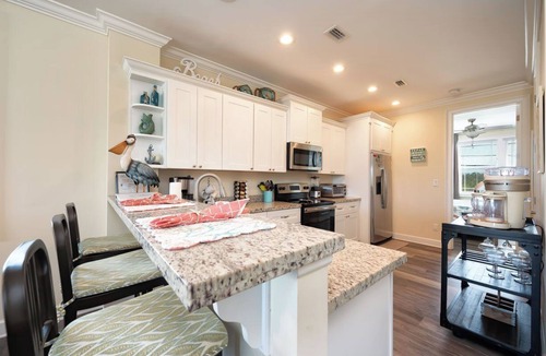 Marathon Villa | Canal Front with Large Custom Pool, Lush Landscaping, Hot Tub, 30' Dock, Kayaks!