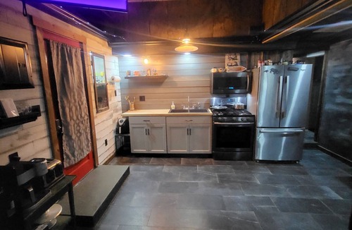 Wales Center Apartment | Carefully crafted 2 bedroom with 2 hot tubs in backyard