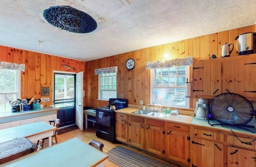 Charlotte Cottage | Century-Old Lakefront Victorian on a Private Island—Boats, Beach & Dog-Friendly