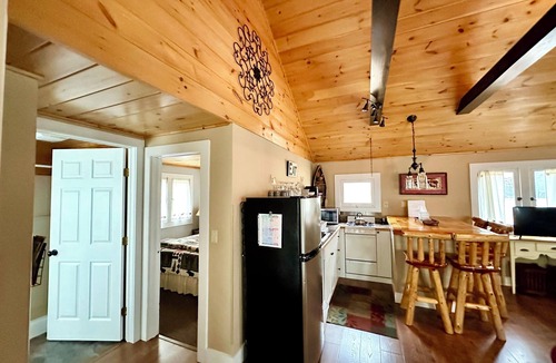Town of Webb Cottage | Charming 1-Bedroom Cottage with wood-burning fireplace