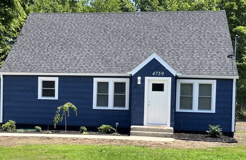 Coloma Cottage | Charming Cape Cod House Minutes From Paw Paw Lake, Wineries, and Wedding Venues