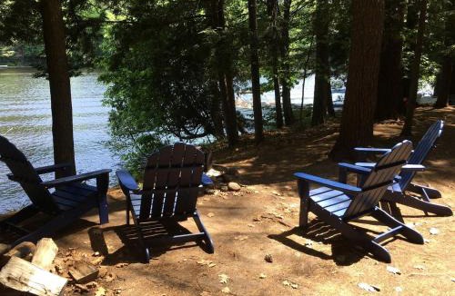 Corinth House | Charming One-Floor Waterfront Cabin with Dock & Fire Pit Near the River | Corinth, New York