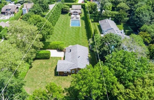Village of Southampton House | Chic Southampton Getaway with heated Pool, minutes to Beach, & Village