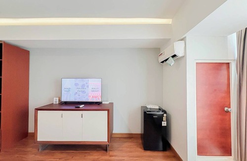 Ngaglik Apartment | Classic Wooden Touch Studio Room At Apartment Mataram City