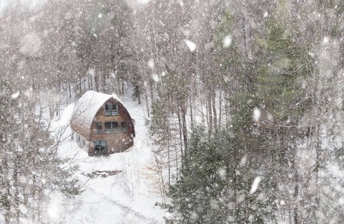 West Fairlee House | Cozy Bow House Perched in Trees w/Hot Tub & View