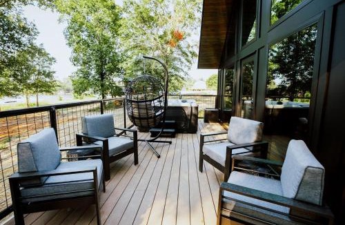 Coosa House | Cozy Modern Cabin with Deck and Hot Tub in Cedar Bluff, Alabama