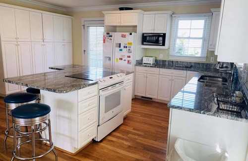 Holden Beach House | Experience oceanfront luxury at Sweet Dreams, a spacious 4BR retreat in Holden Beach.