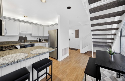 Downtown Syracuse Condo | Historic Armory Square Stay with Private Outdoor Space