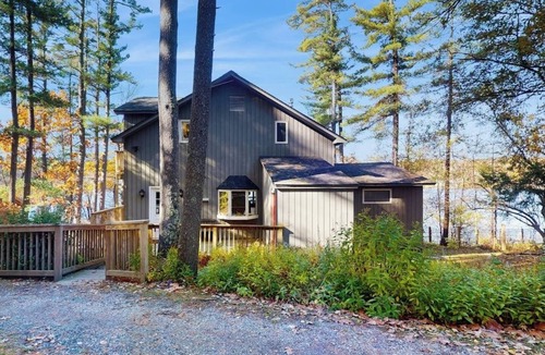 Castleton House | Lakefront home near ski resorts with water view, dock, deck, fireplaces, & W/D