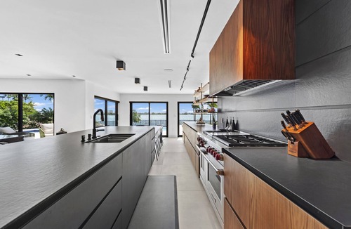 San Souci Estates Villa | Luxurious Tranquil Resort Mansion in Vibrant Miami Awaits