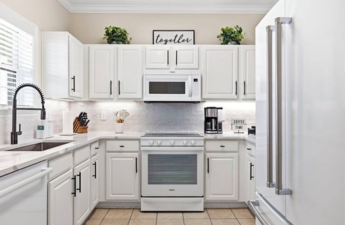 North Myrtle Beach Villa | Luxury Golf-View Condo Barefoot Resort Resort Pools Premium Beach Gear