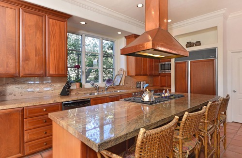 Muirlands Villa | Mediterranean magic in a sun-kissed tropical oasis with pool and pizza oven.