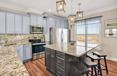 Oak Island House | Oceanfront Serenity Sands in Oak Island, NC, boasts 8 bedrooms for 20 guests.
