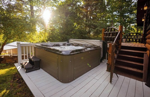 Yulan House | Private log cabin nestled at the base of a secluded wooded area
