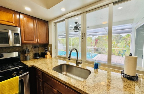 Sunrise Villa | Riverfront, King Bed, Pool & Nearby Beach
