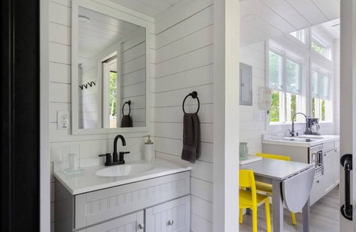 Johnson Cabin | Riverside Luxury Tiny House w/Treehouse Sauna, Hot Tub & Views Near Stowe