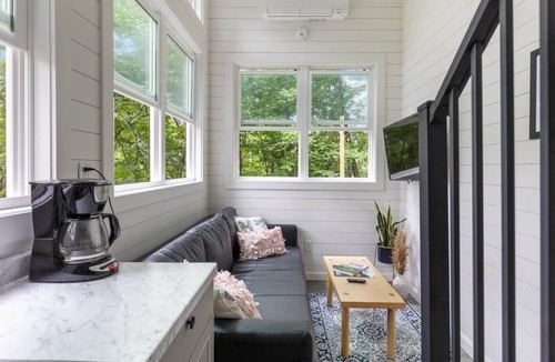 Johnson Cabin | Riverside Luxury Tiny House w/Treehouse Sauna, Hot Tub & Views Near Stowe