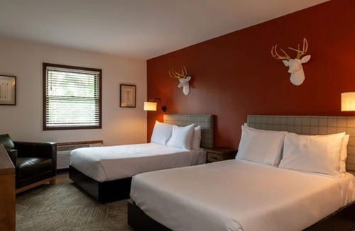 Schroon Lake Hotel | Rustic Lodge Retreat Located at Schroon Lake | Outdoor Fire Pit | Indoor Pool