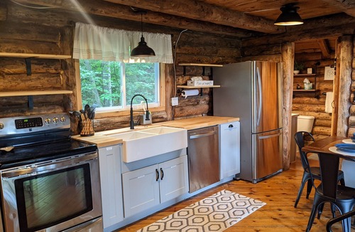 Bear Lake Cabin | Rustic Retreat Log Cabin Nestled Among 65 Acres