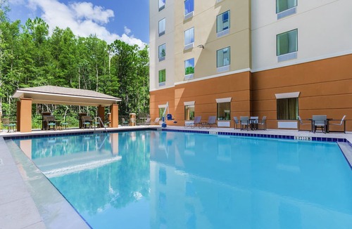 Florida Central Atlantic Coast Apartment | Smart King Studio | Pool & BBQ Grill | 3 mi to Walt Disney World Resort
