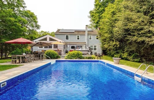 Norwalk House | Spacious 4-bedroom house with AC in tranquil Norwalk. Year round hot tub. Pool