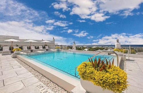 Seacrest Villa | Stylish Beachside Retreat with Balcony For Family Getaways