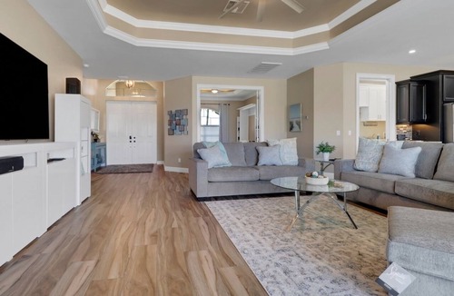 Burnt Store Villa | Tee Times and Tan Lines 1006 4 BR Heated Pool & Spa Retreat on Coral Oaks Golf Course