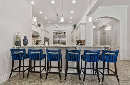 Reunion Villa | The Portal at Reunion | 9 Bed 10.5 Bath, Southwest Facing Pool Villa with Theater Room