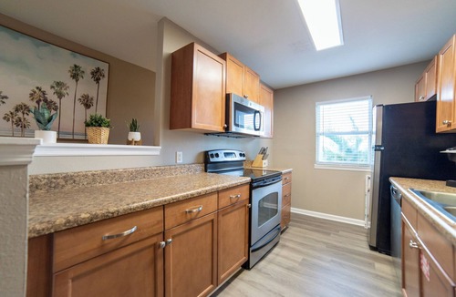 Holiday Beach House | Walking Distance to the Beach 2BR townhome in PCB Perfect for families with kids