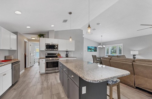 Englewood East Villa | Waterfront Escape: Heated Saltwater Pool & Canal Views!