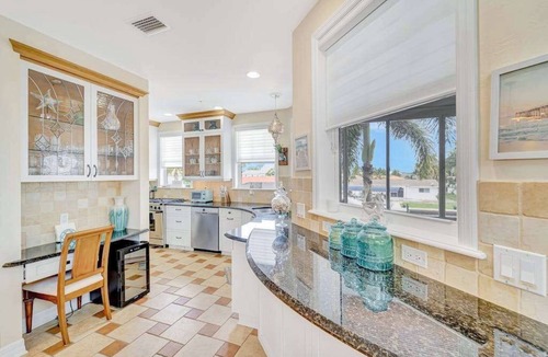 Matlacha House | Waterfront home with private pool, dock, patio, balconies, & bikes