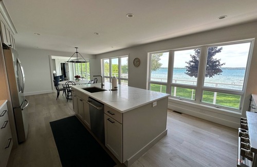 Elk Rapids House | Waterfront Lakehouse - Completely Remodeled - Watersports + Hot Tub