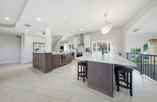 Palm Harbor Villa | Waterfront Pool Balcony + Game Room