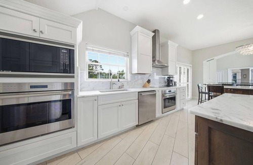 Palm Harbor Villa | Waterfront Pool Balcony + Game Room