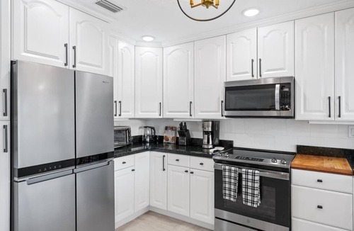 Cypress Lakes Villa | Waterfront Villa w/View, Heated Pool & Boat Rental