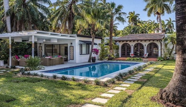 A Miracle Waterfront Villa In The Green in Miami!