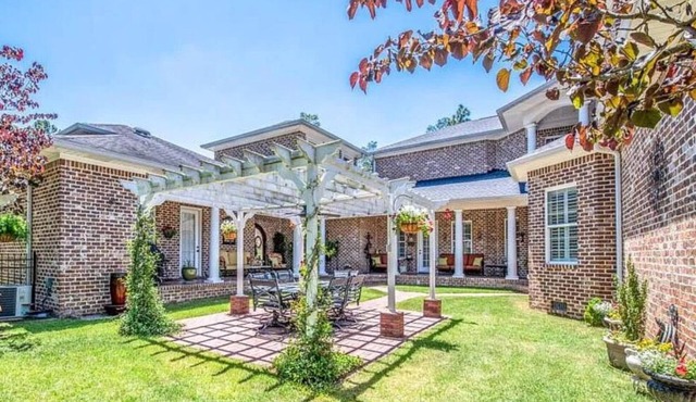 Beautiful 6 bedroom home with a brand new swimming pool, and 4 fireplaces.