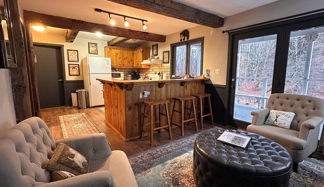 Black Bear Suite - Amazing 2BR suite with deck overlooking the Trout River & only 7 minutes to Jay Peak Resort. With Breakfast Included!