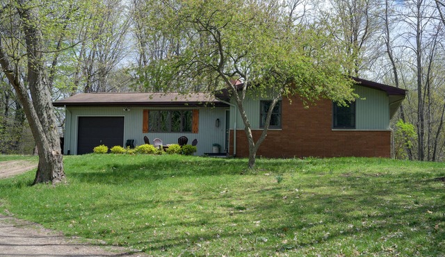 Charming home on 5 acres of forest with 2 patios, minutes away from town/beach